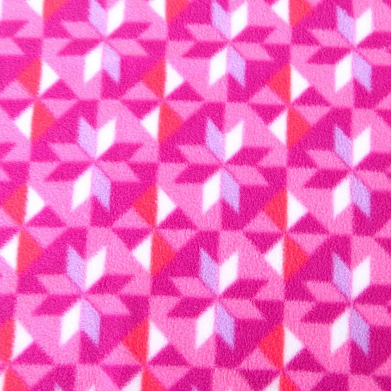 Magenta fleece fabric with repeating pink and white geometric star pattern