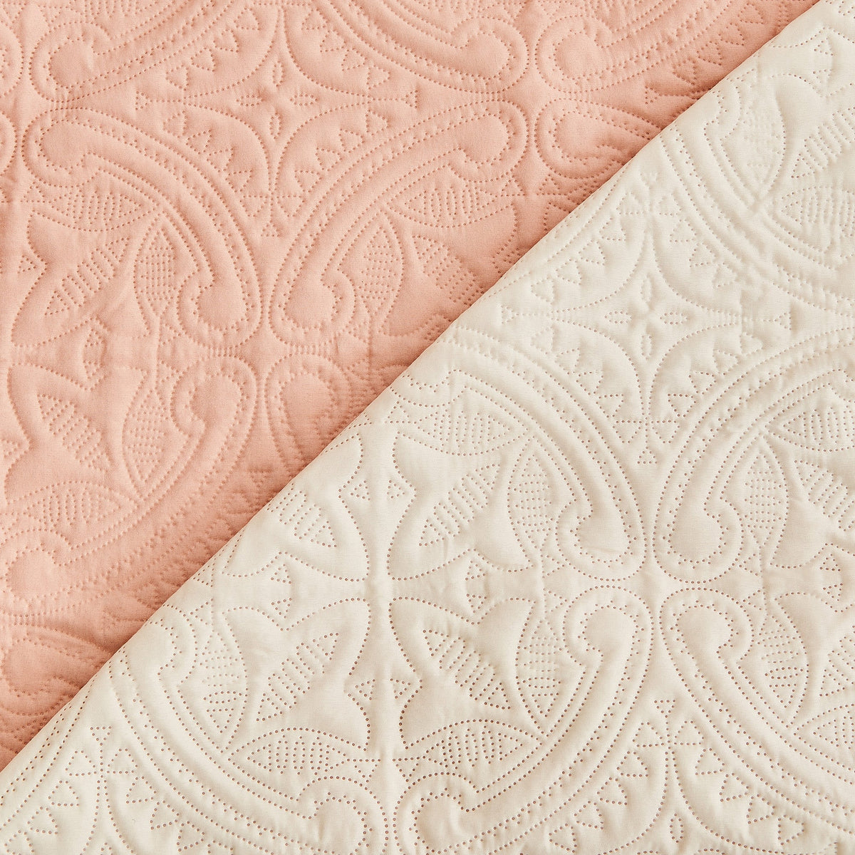 Dusty pink and ivory medallion quilt fabric protector, two-panel close-up