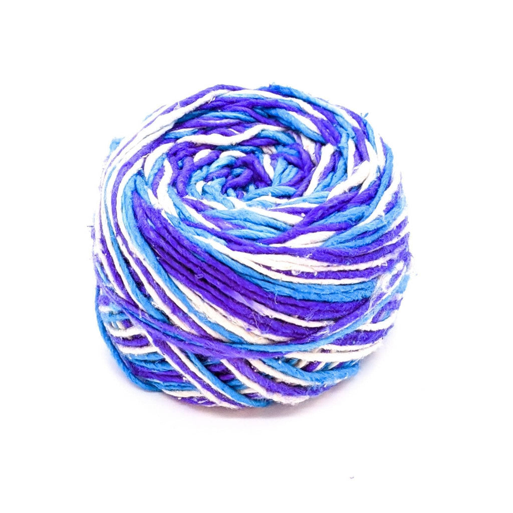 Variegated yarn ball in purple, blue, and white