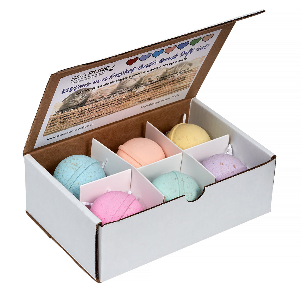 Bath bomb gift set box with six pastel round bombs in separate compartments