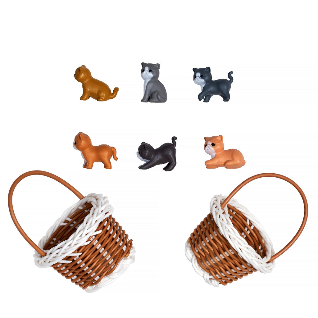 Two mini wicker baskets with multiple small cat figurines