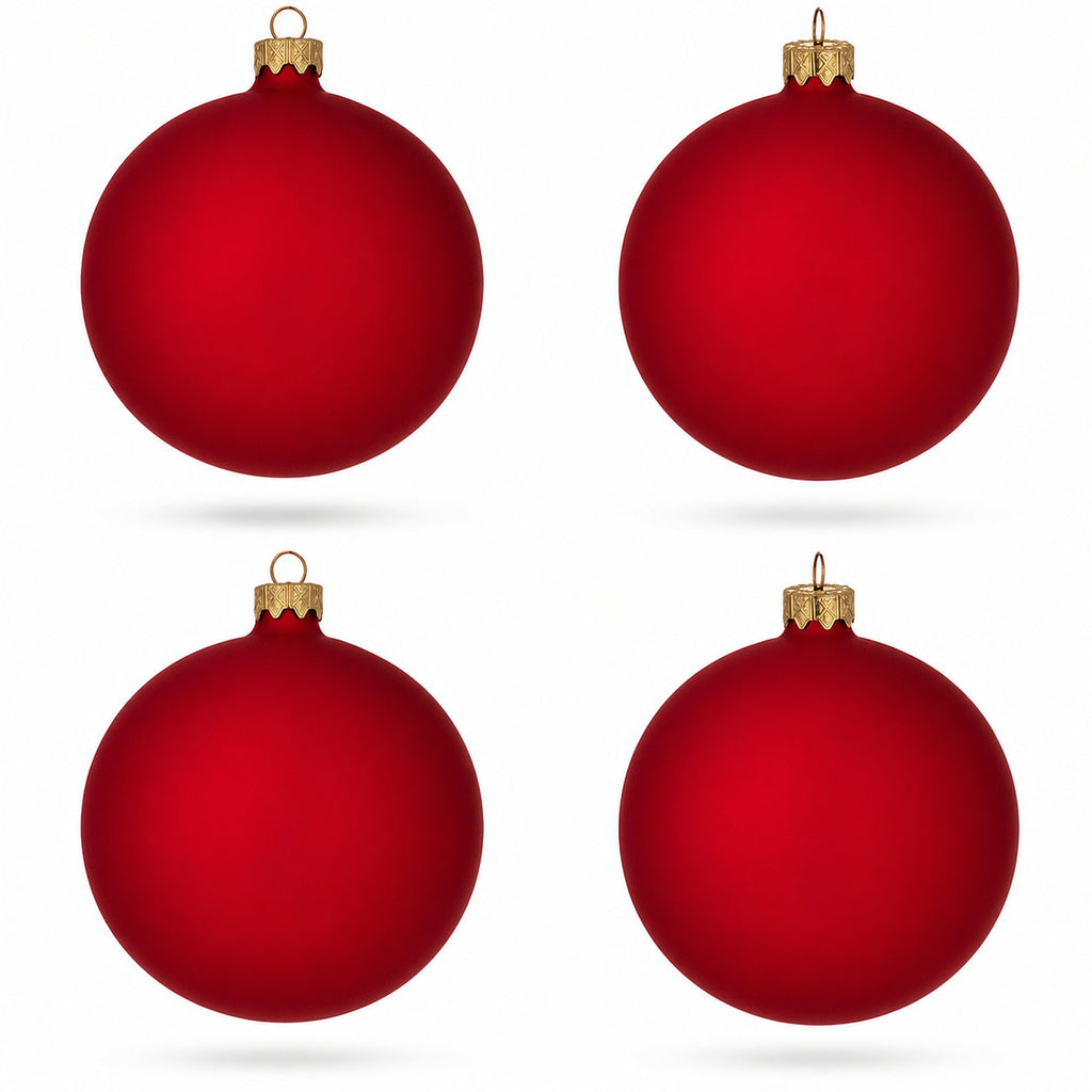 Set of 4 red matte glass ball Christmas ornaments with gold caps and hanging loops