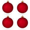Set of 4 red matte glass ball Christmas ornaments with gold caps and hanging loops