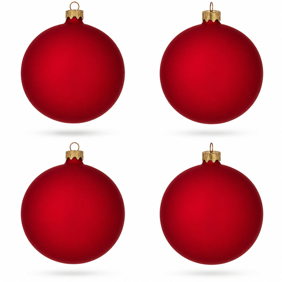 Set of 4 red matte glass ball Christmas ornaments with gold caps and hanging loops