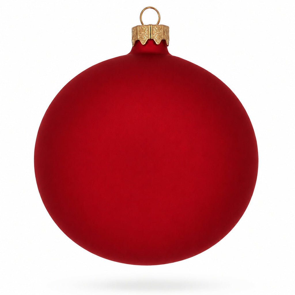 Red matte glass ball Christmas ornament with gold cap and hanging loop