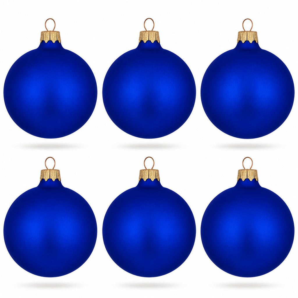 Set of 6 blue matte glass ball ornaments with gold caps and hanging loops