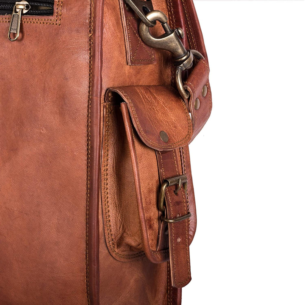 Leather briefcase side view with small buckle pocket and attachment straps.