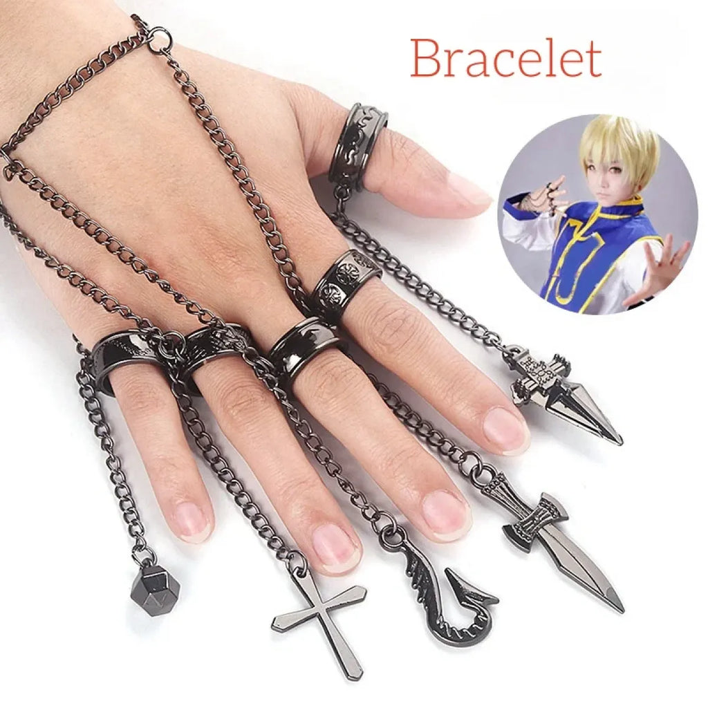 Metal chain bracelet set with sword and cross charms on hand