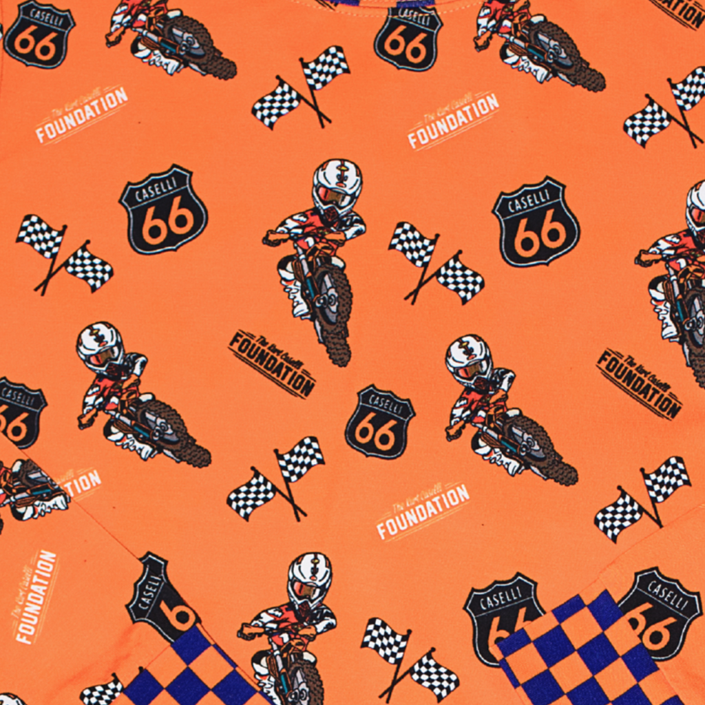 Orange fabric close-up with racing moto icons, flags, and checkered 66 logos