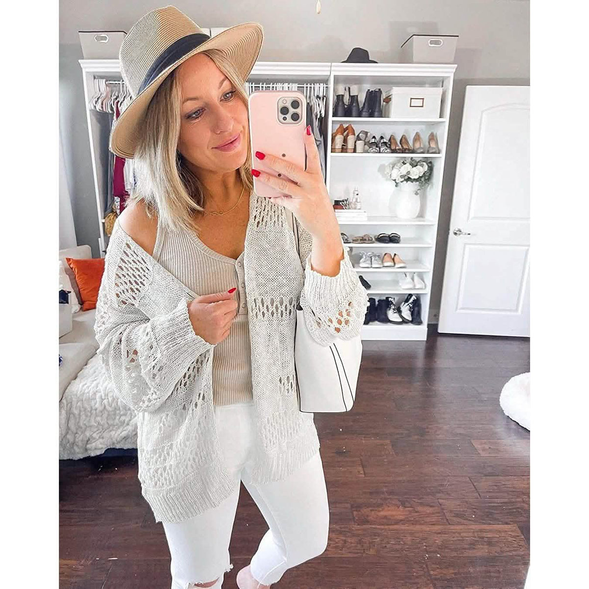 Light gray crochet cardigan sweater with open front and long sleeves