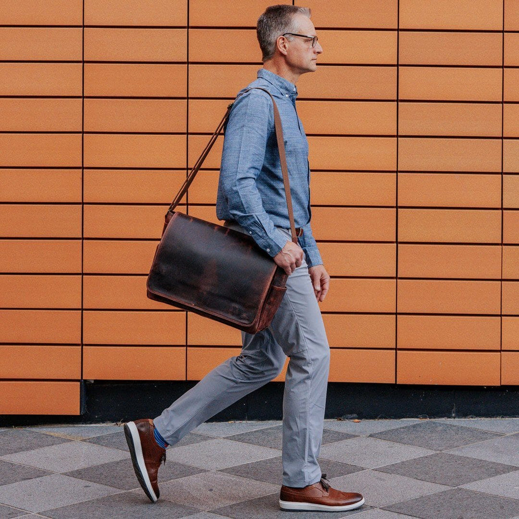 Wilson crossbody bag on shoulder, dark brown leather-look with flap front and straps