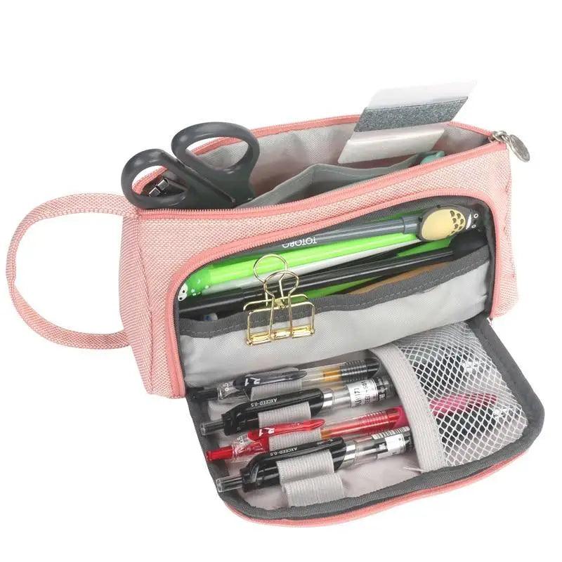Large-capacity pink pencil case with grid panels, open front, mesh pocket and clips.