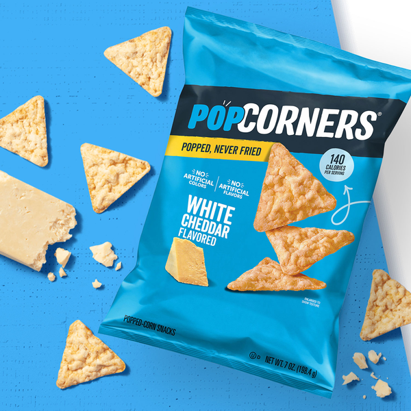 PopCorners snack bag with scattered triangular popped-corn crisps