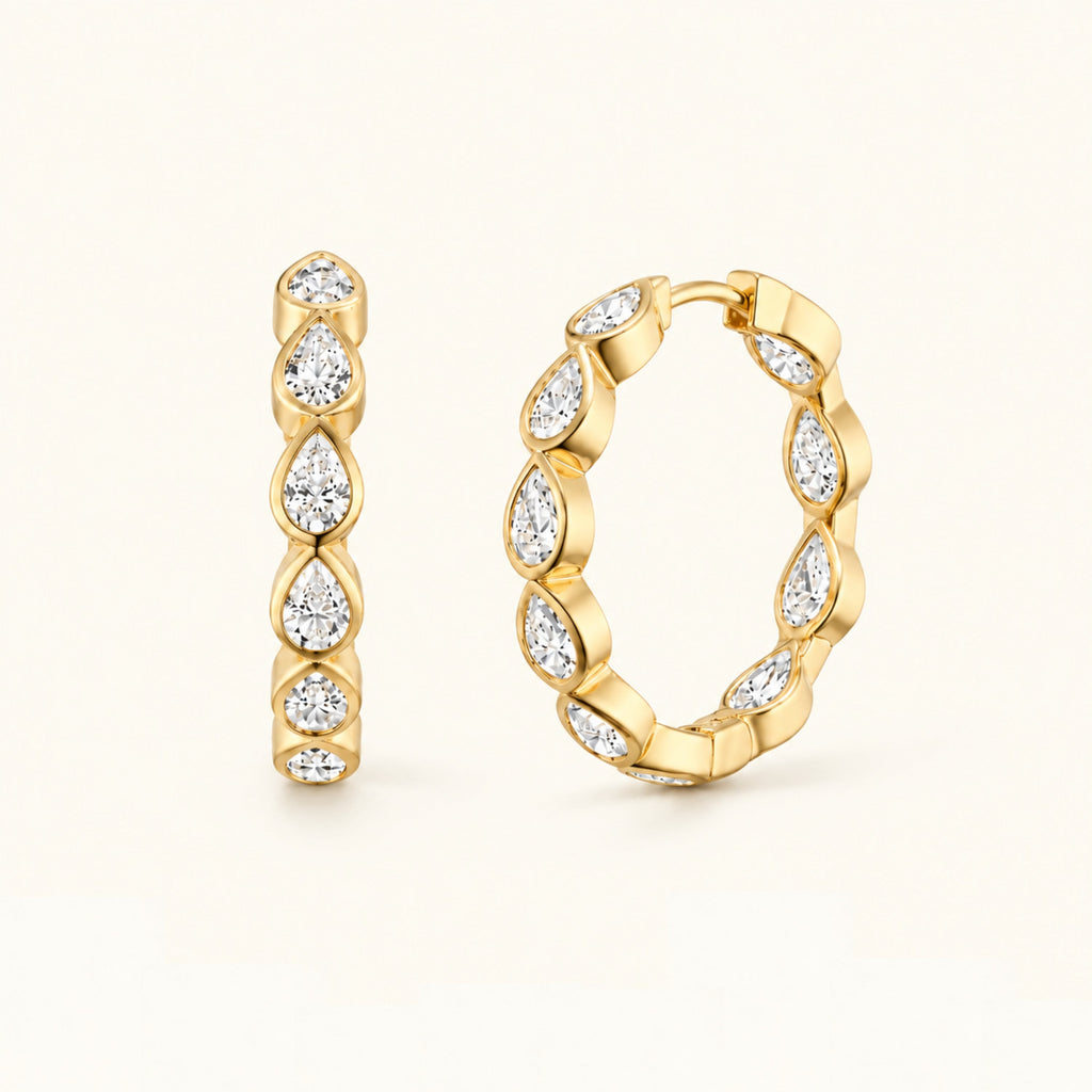Gold marquise hoop earrings with cascading oval crystal stones