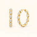 Gold marquise hoop earrings with cascading oval crystal stones