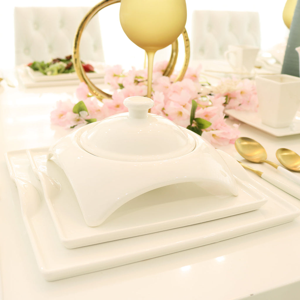 White porcelain covered tureen with lid finial on a square base tray