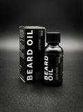Beard oil bottle and box, black packaging with LeatherDaddy Skin Co. label