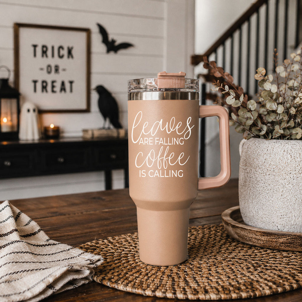 Taupe 40oz travel tumbler with clear lid and straw, rose handle, “Leaves are falling” design