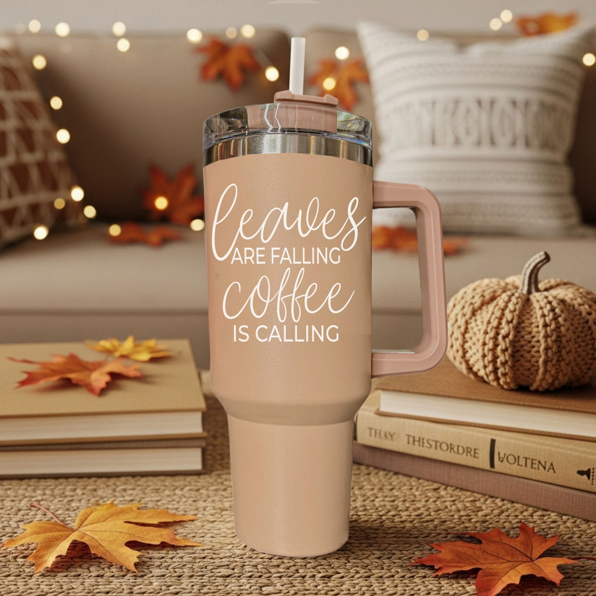 Taupe 40oz travel tumbler with clear lid and straw, rose handle, “Coffee is calling” text