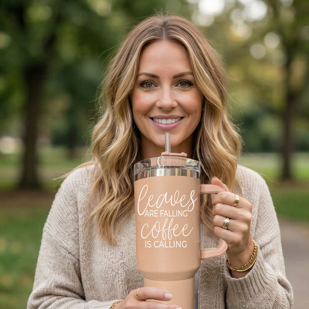 40 oz light rose tumbler cup with handle, clear lid, straw; “Coffee is calling”