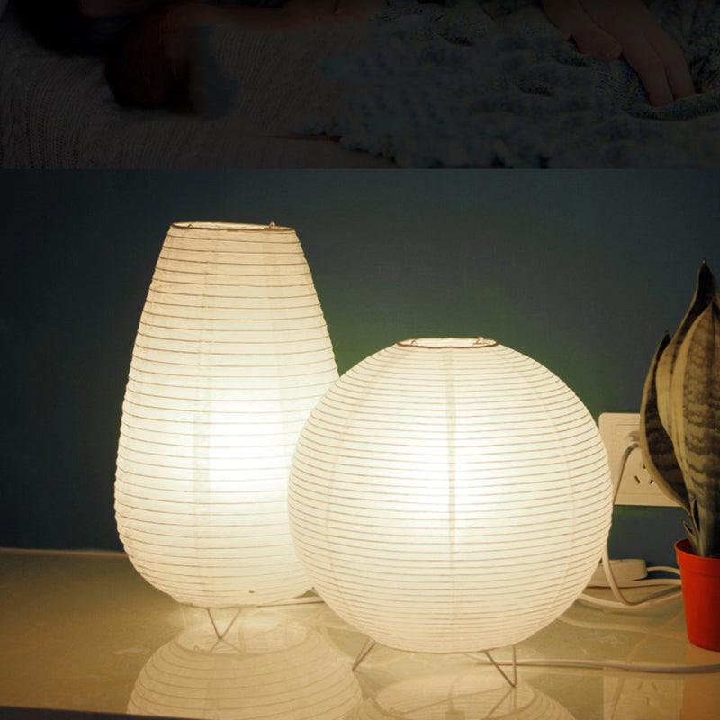 LED paper lantern desk lamp with white round shade on wire tripod base