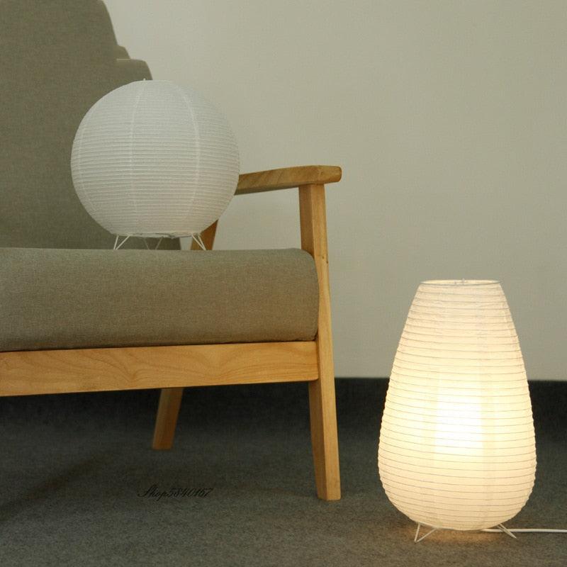 LED paper lantern desk lamp with round white paper shade on wire tripod base