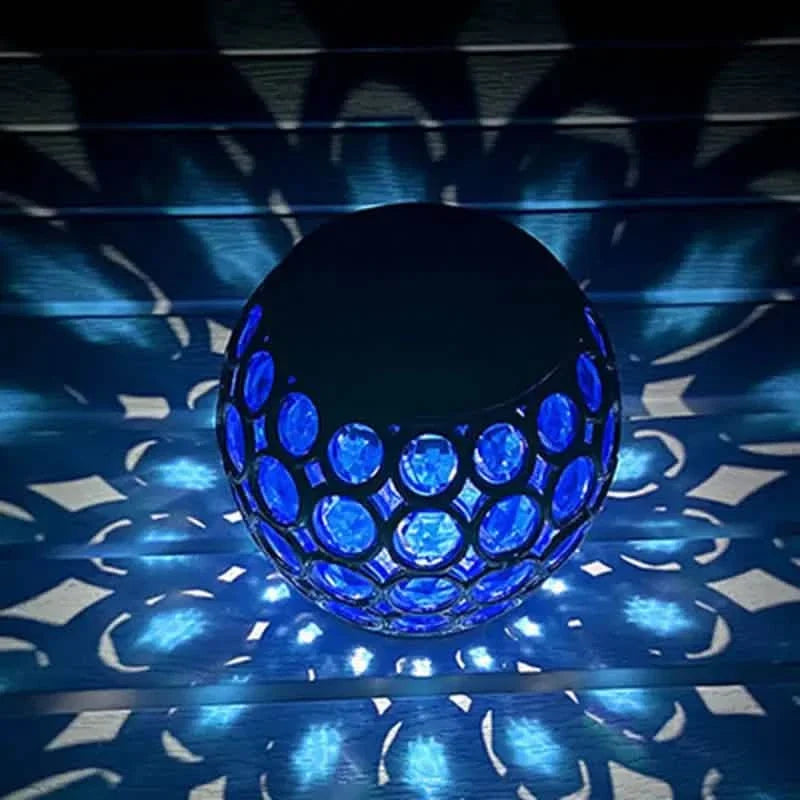 Glowing blue LED solar hollow lawn lamp with mosaic glass globe