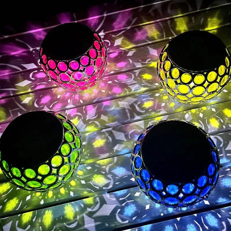 LED solar hollow lawn lamp set glowing pink, yellow, green, and blue mosaic globes