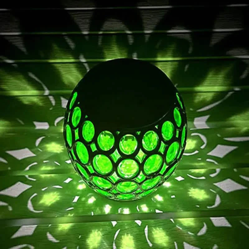Glowing green LED solar hollow lawn lamp with mosaic glass globe
