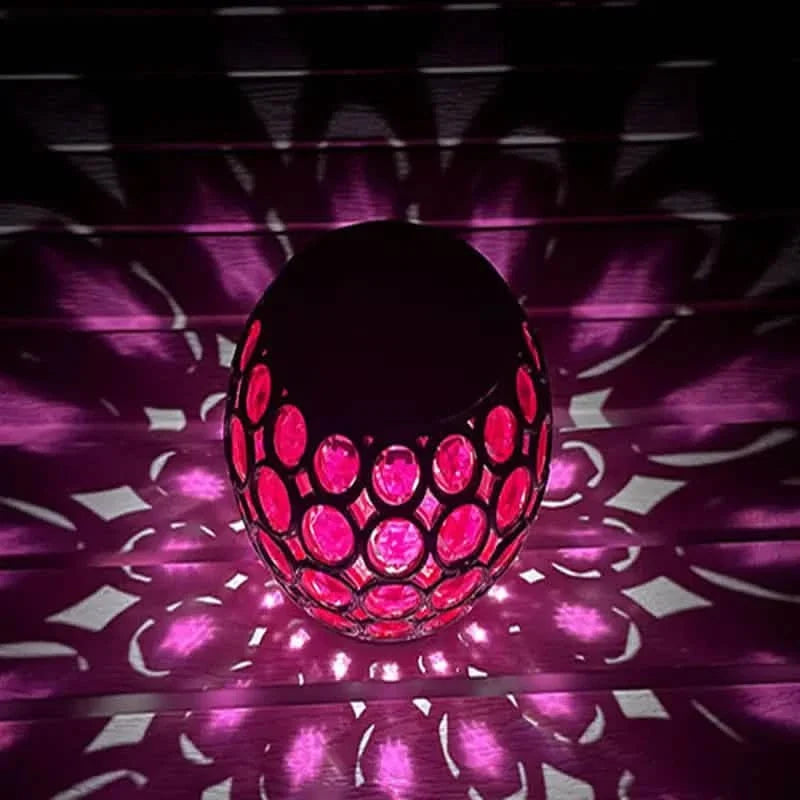 Glowing pink LED solar hollow lawn lamp with mosaic glass globe