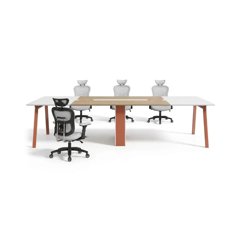 White collaborative meeting table with wood-tone legs and central pedestal base.