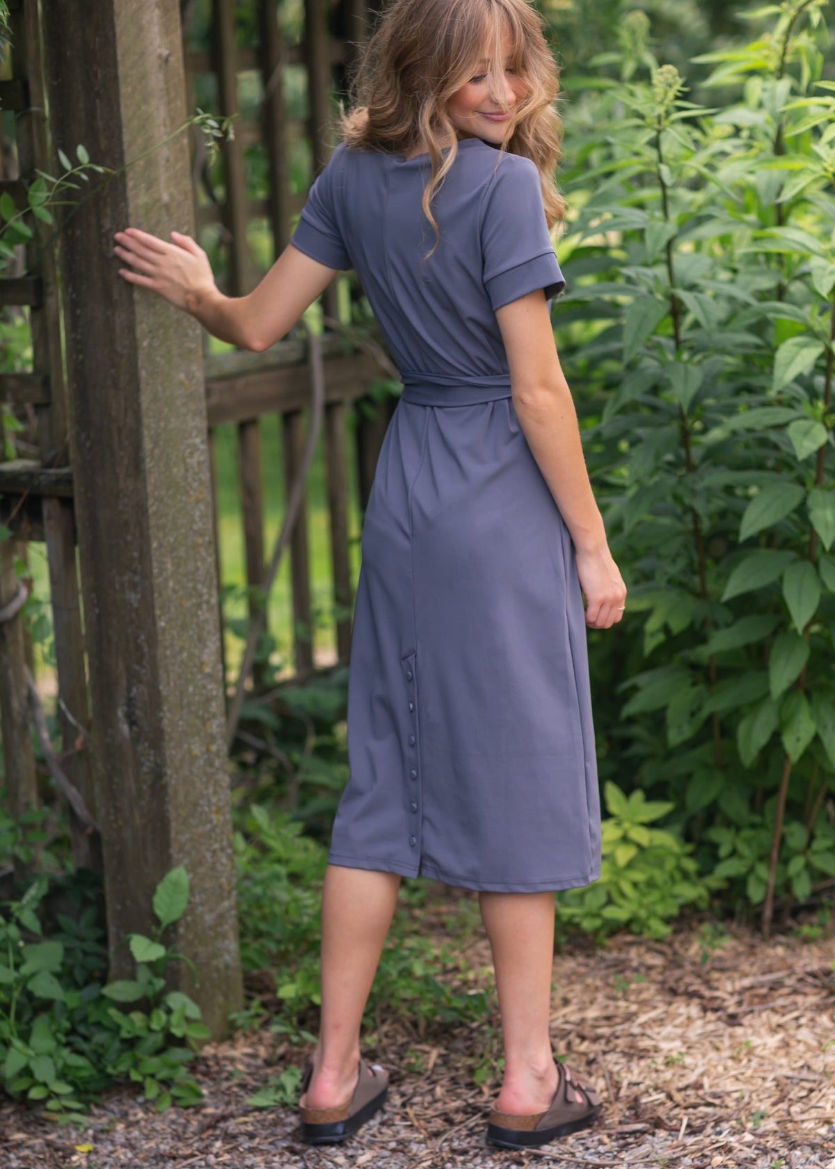 Lennox midi dress in slate blue, crew neck, short sleeves, tie waist, button placket.
