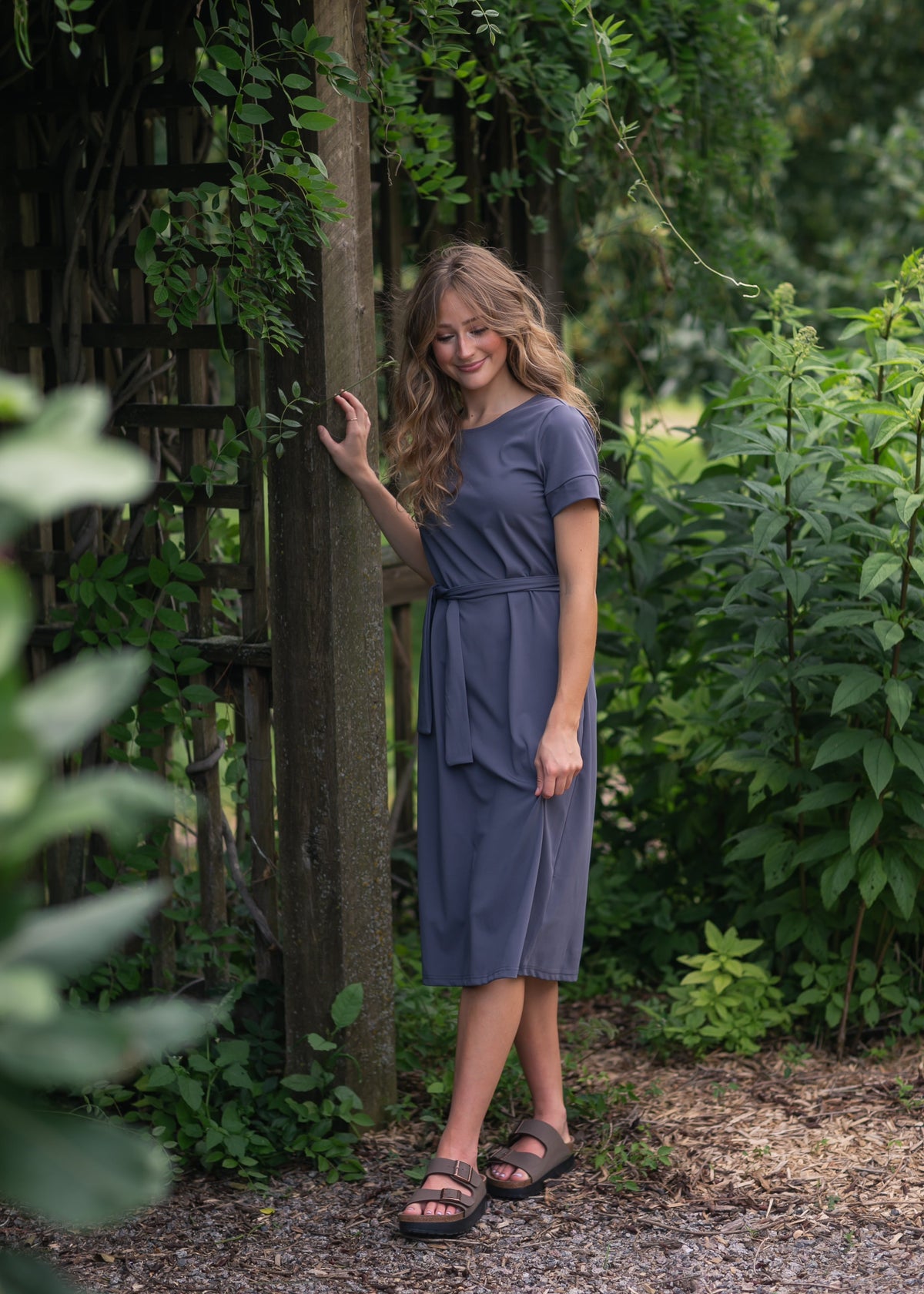 Lennox midi dress in slate blue, crew neck and short sleeves, tie waist detail.