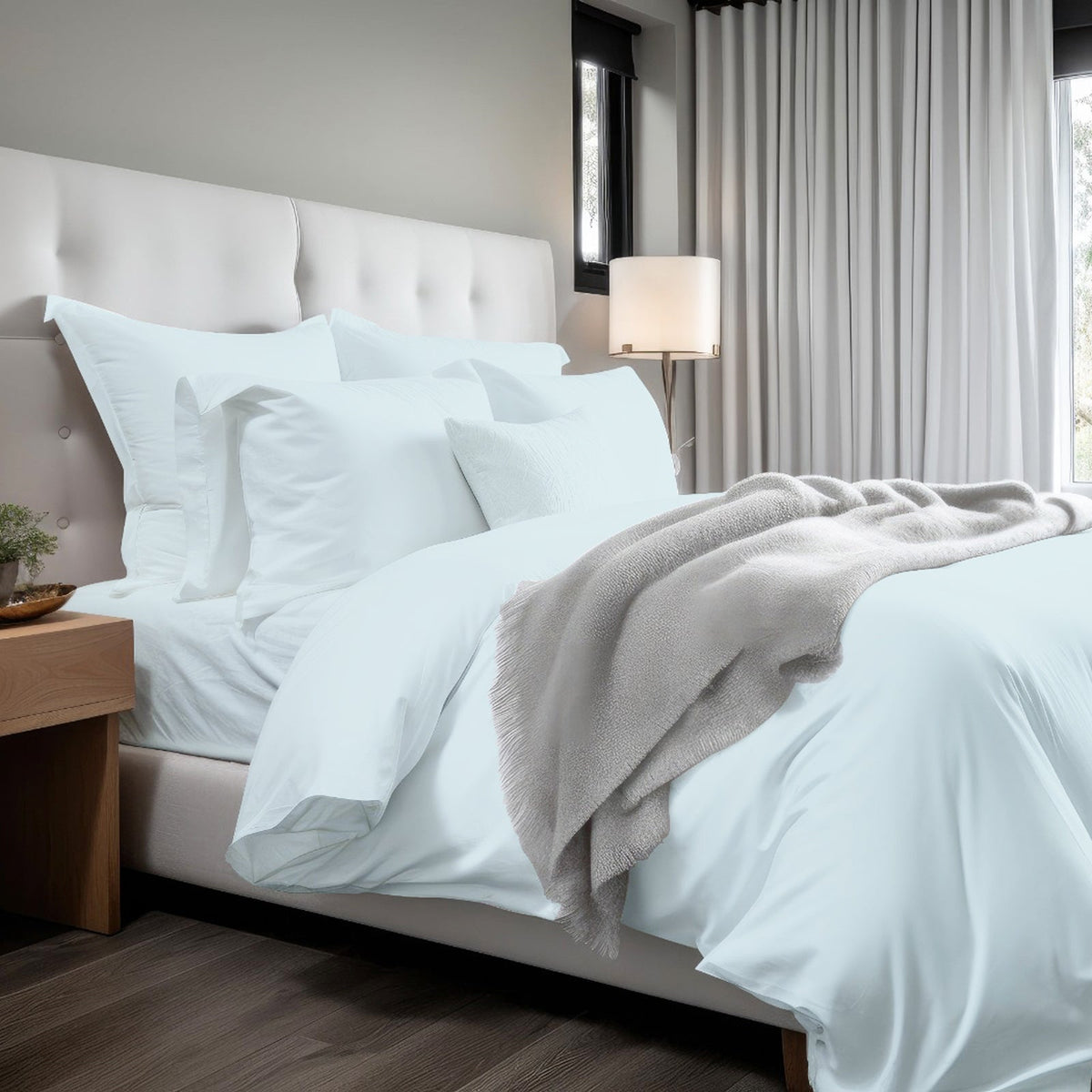 Cotton sateen solid duvet cover set in light blue with matching pillow shams
