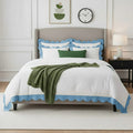 White duvet cover set with light blue wavy scallop applique border and shams