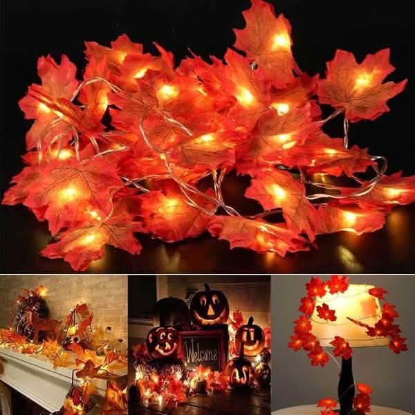 Warm LED light garland with glowing orange leaf-shaped bulbs