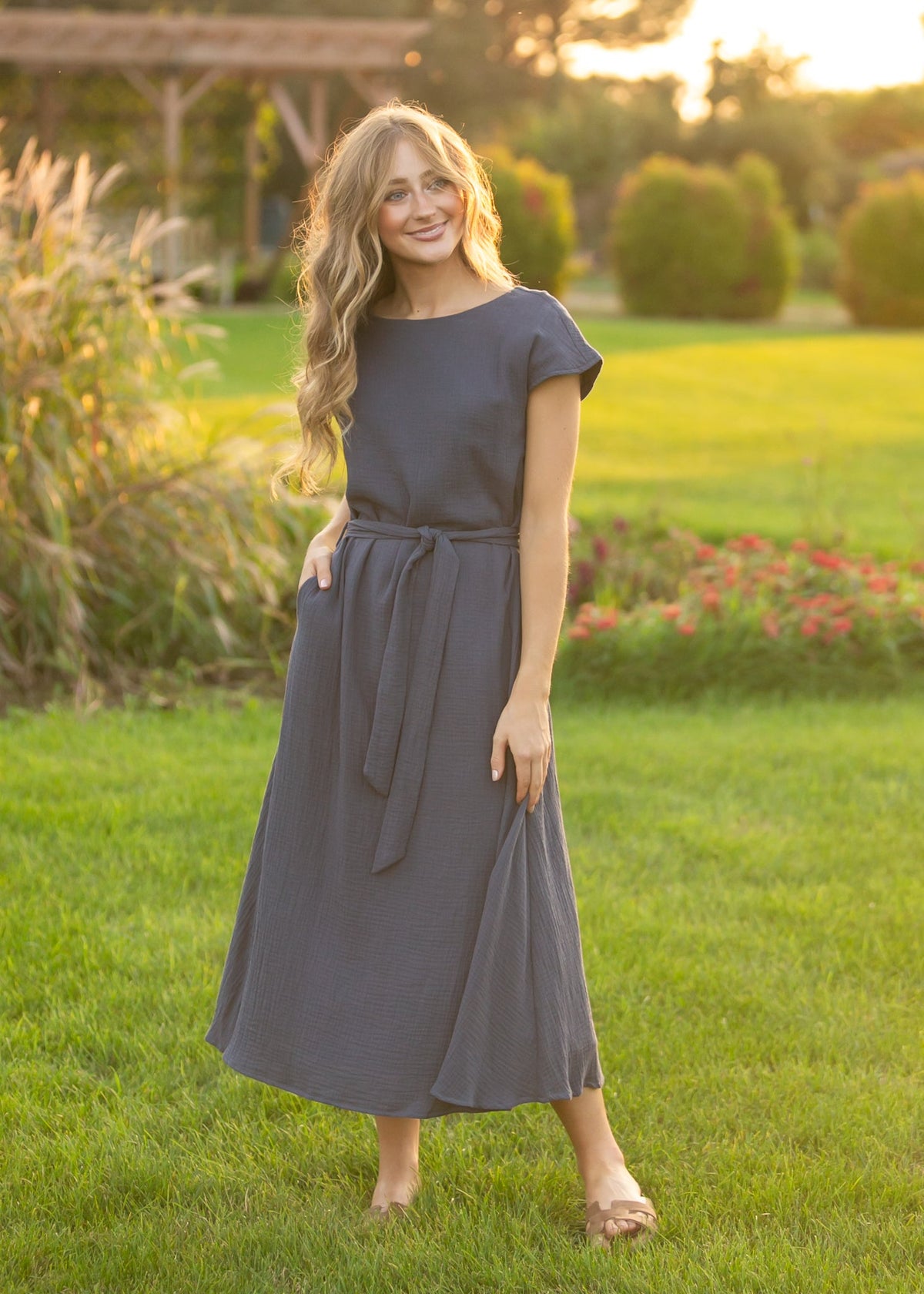 Navy gauze belted midi dress with short sleeves and tie waist