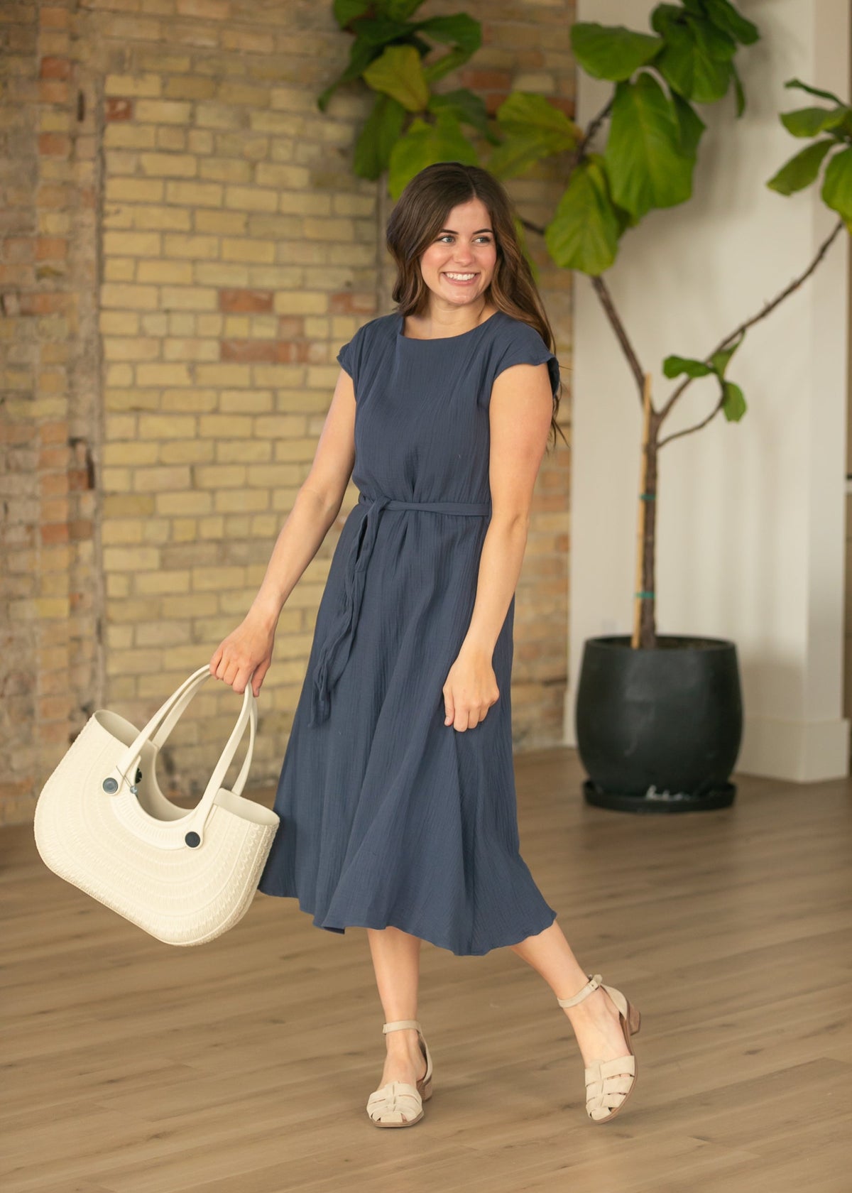 Blue belted midi dress with short sleeves and gathered waist detail