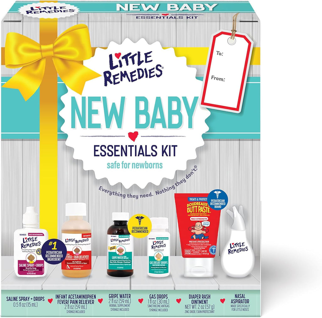New baby essentials kit box with bow, showing newborn bottles and tubes