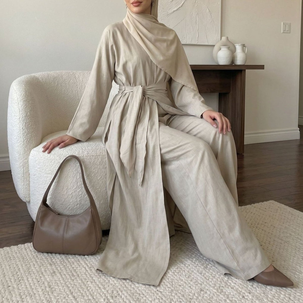 Long top with tied waist, wide-leg trousers, triangle scarf, light cream co-ord