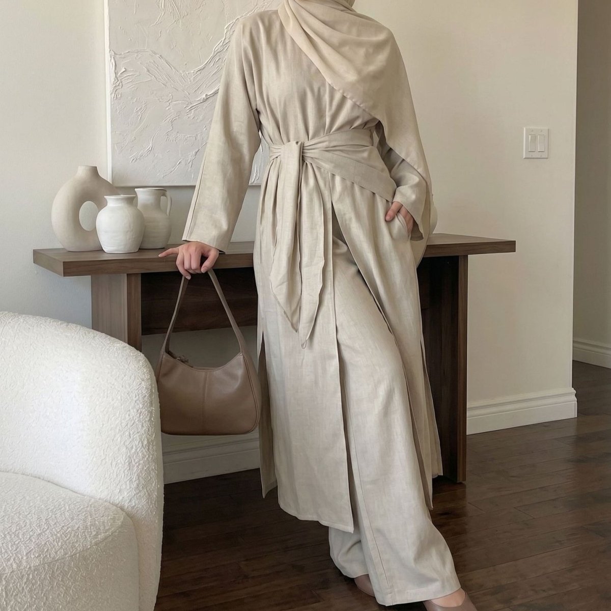 Three-piece co-ord set: long top, wide-leg trousers, triangle scarf, light cream