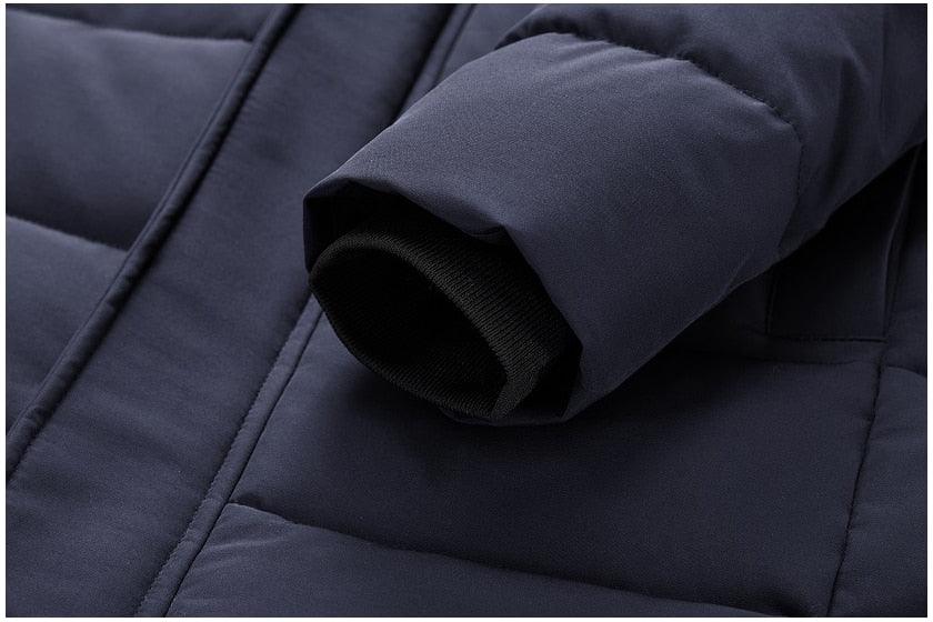Dark blue puffer jacket cuff with inner sleeve opening