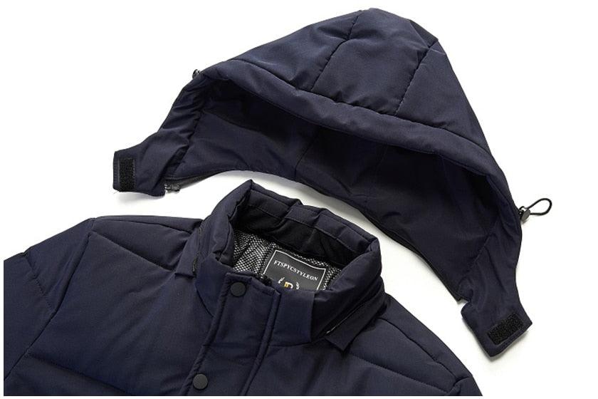 Dark blue hooded puffer jacket with adjustable hood and snap front