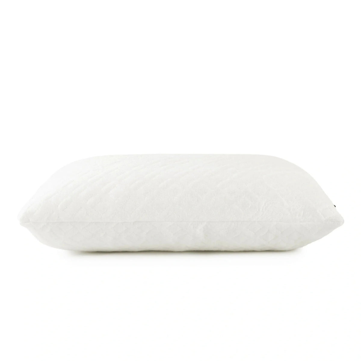 White lumbar cooling pillow, rounded shape with subtle quilted texture