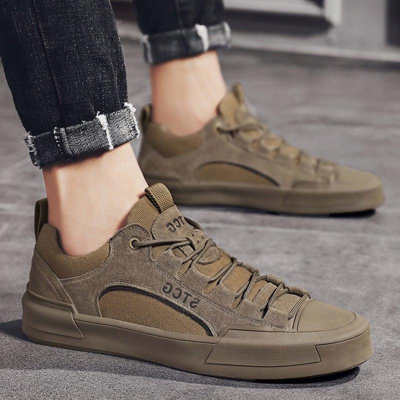 Men's tan lace-up sneakers with textured upper and padded ankle