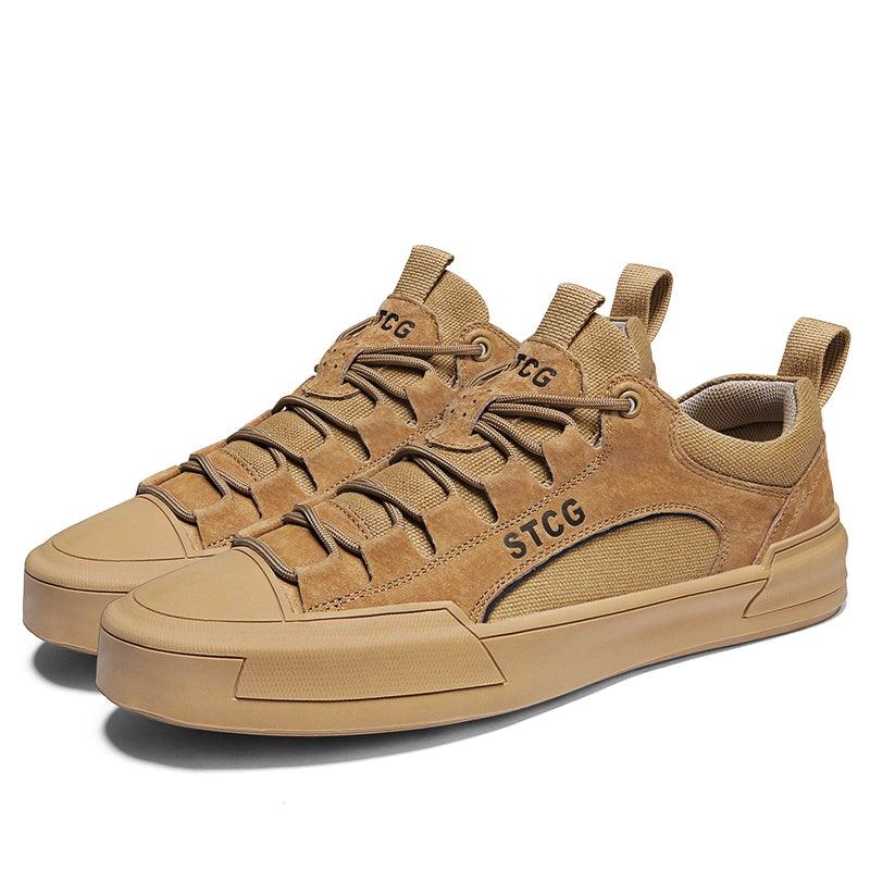 Tan lace-up sneakers with STCG side logo and cushioned low-profile rubber sole