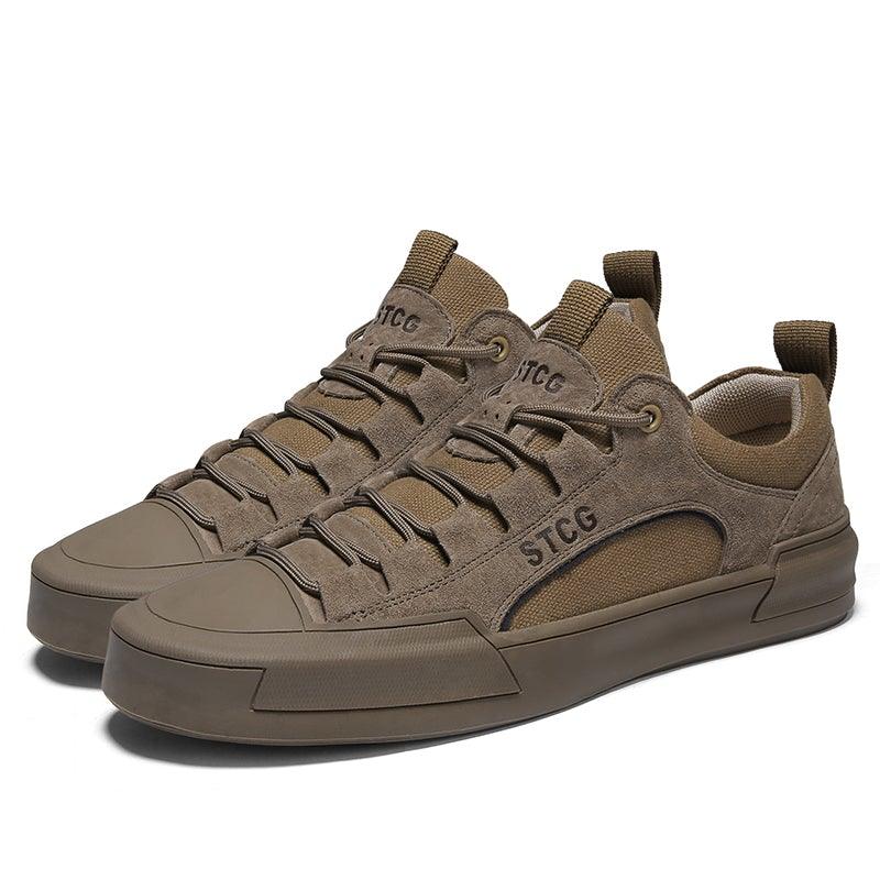 Dark tan lace-up sneakers with STCG side logo and low-profile rubber sole