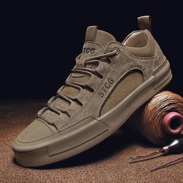 Lace-up men’s sneakers in dark tan suede with chunky rubber sole and STCG branding