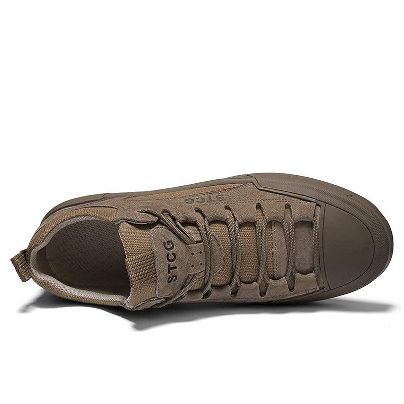 Men's tan lace-up sneaker, outsole and toe tread visible