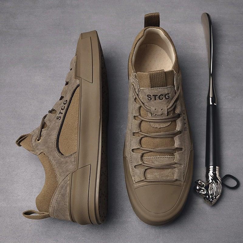 Men's tan lace-up sneakers with side logo and cushioned collar